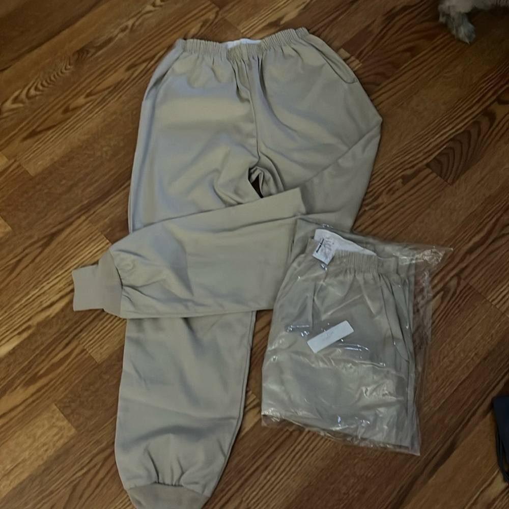 Two pair brand, new uniform city size small khaki scrubs